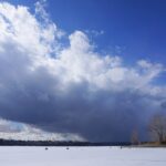 Big Alberta sky over the frozen Glenmore Reservoir in Calgary
