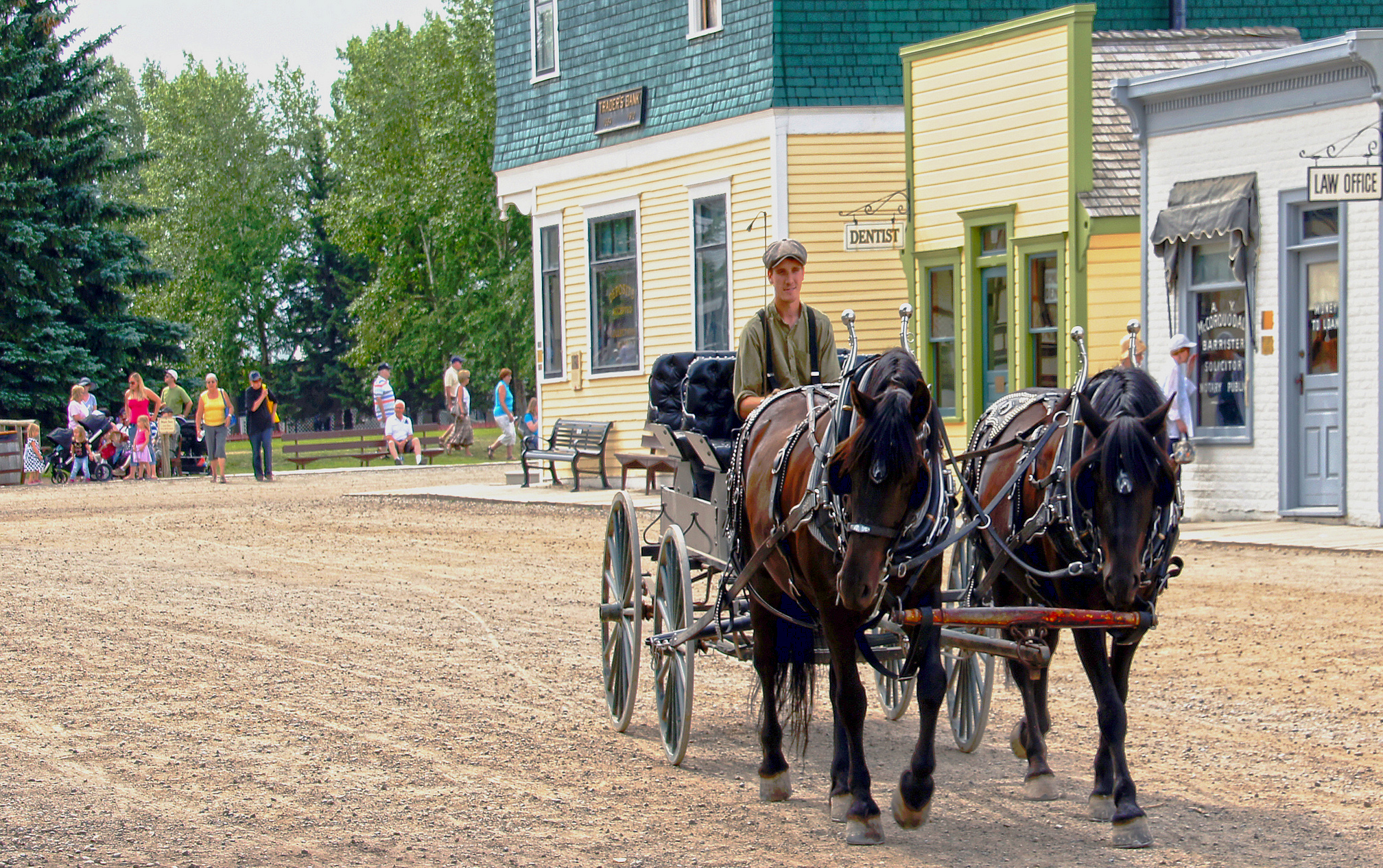 A horse-drawn carriage on the main street of Heritage Park Historical Village