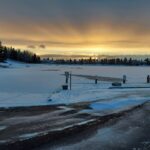 Sunset over a snow-covered Lake Midnapore in south Calgary